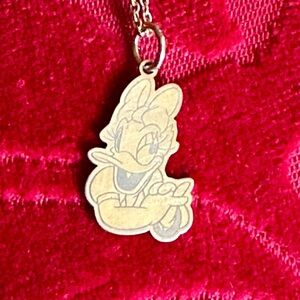 Licensed Disney 14kt Gold Plated Daisy Duck Pendant. 20” adjustable gold chain